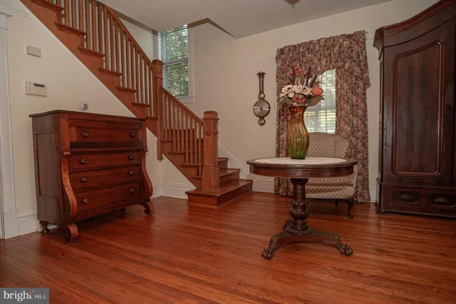 a bathroom with a sink a mirror and a bathtub