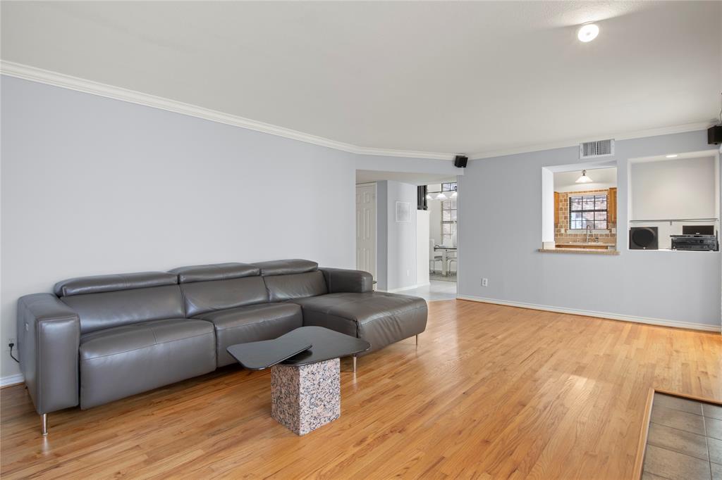 18914 Ravenglen Court Dallas, TX 75287 - Photo 11 of 33 Family Room nicely connects with the Kitchen