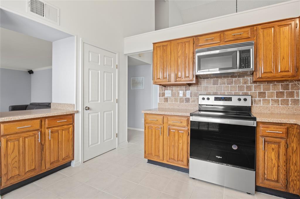 18914 Ravenglen Court Dallas, TX 75287 - Photo 14 of 33 View of the Kitchen and pantry