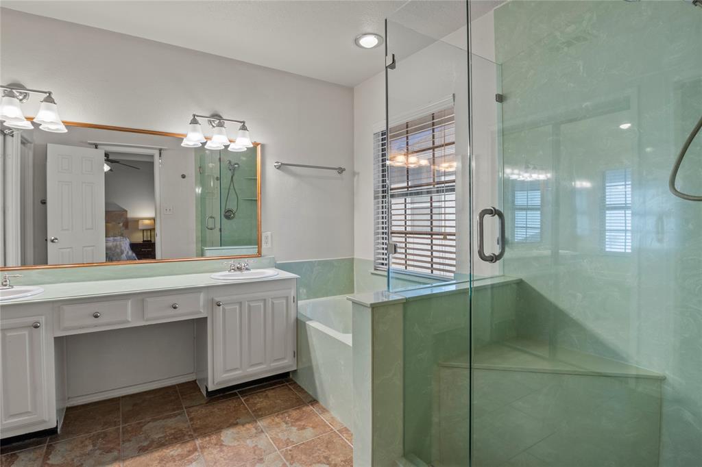 18914 Ravenglen Court Dallas, TX 75287 - Photo 19 of 33 Double sinks, separate tub and shower