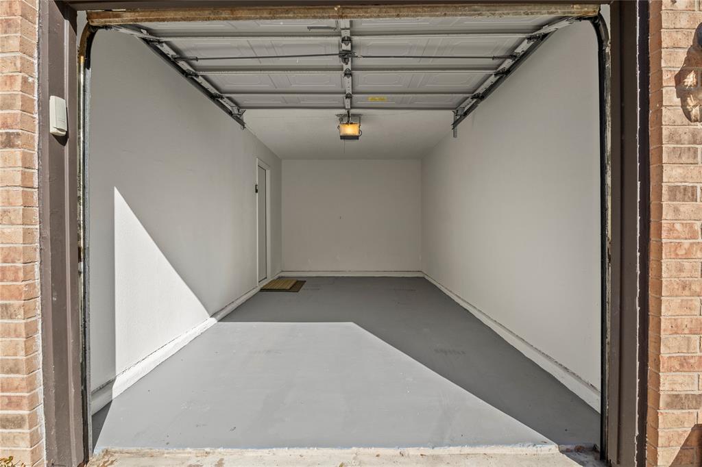 18914 Ravenglen Court Dallas, TX 75287 - Photo 30 of 33 Freshly painted Garage