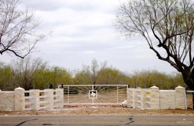 a view of a yard and covered with snow