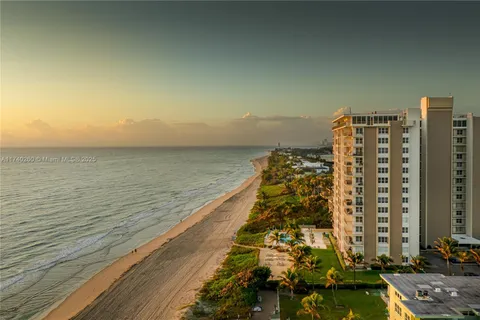 a view of roof with balcony