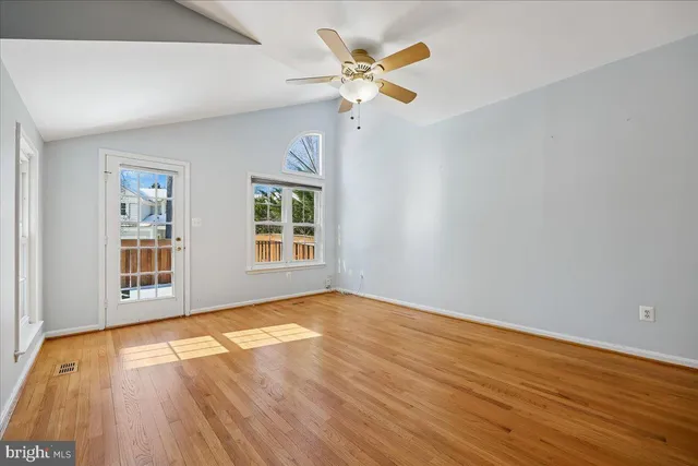 a view of a hallway with staircase