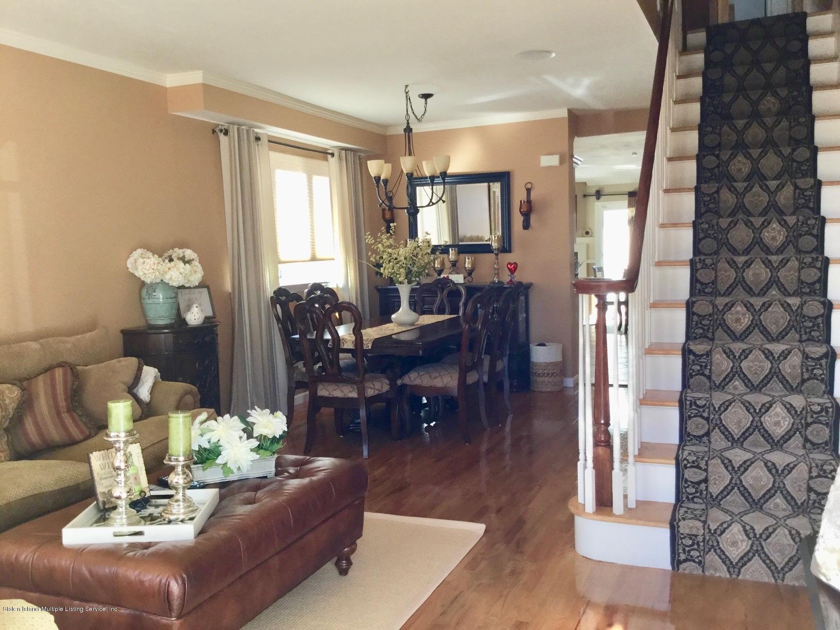 16 Ralph Avenue Staten Island, NY 10312 - Photo 7 of 38 living room and dining room