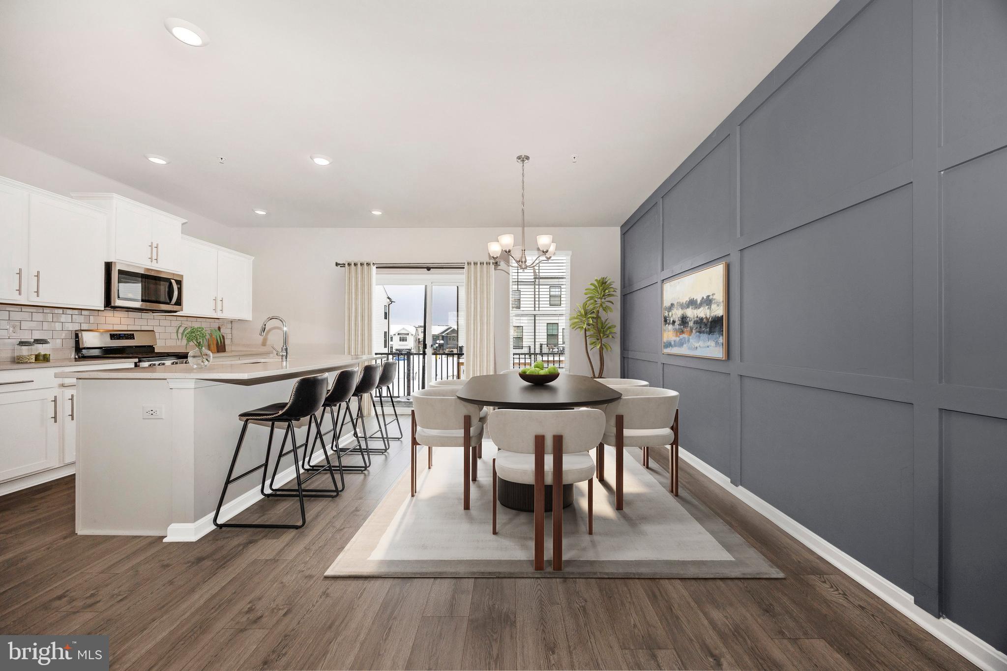 270 Ensemble Way Frederick, MD 21701 - Photo 20 of 43 a view of a dining room with furniture and wooden floor