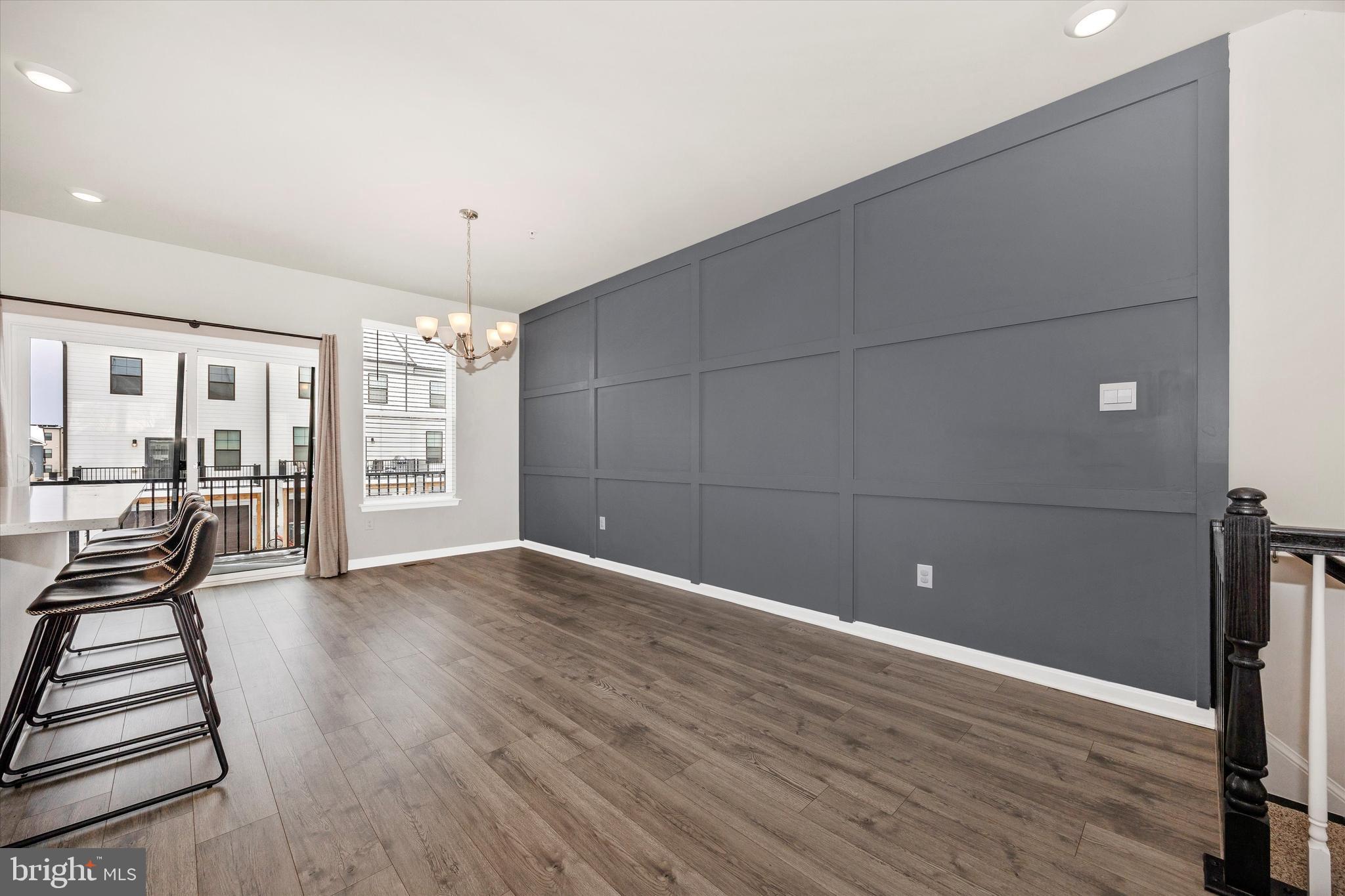 270 Ensemble Way Frederick, MD 21701 - Photo 22 of 43 wooden floor in an empty room with a window