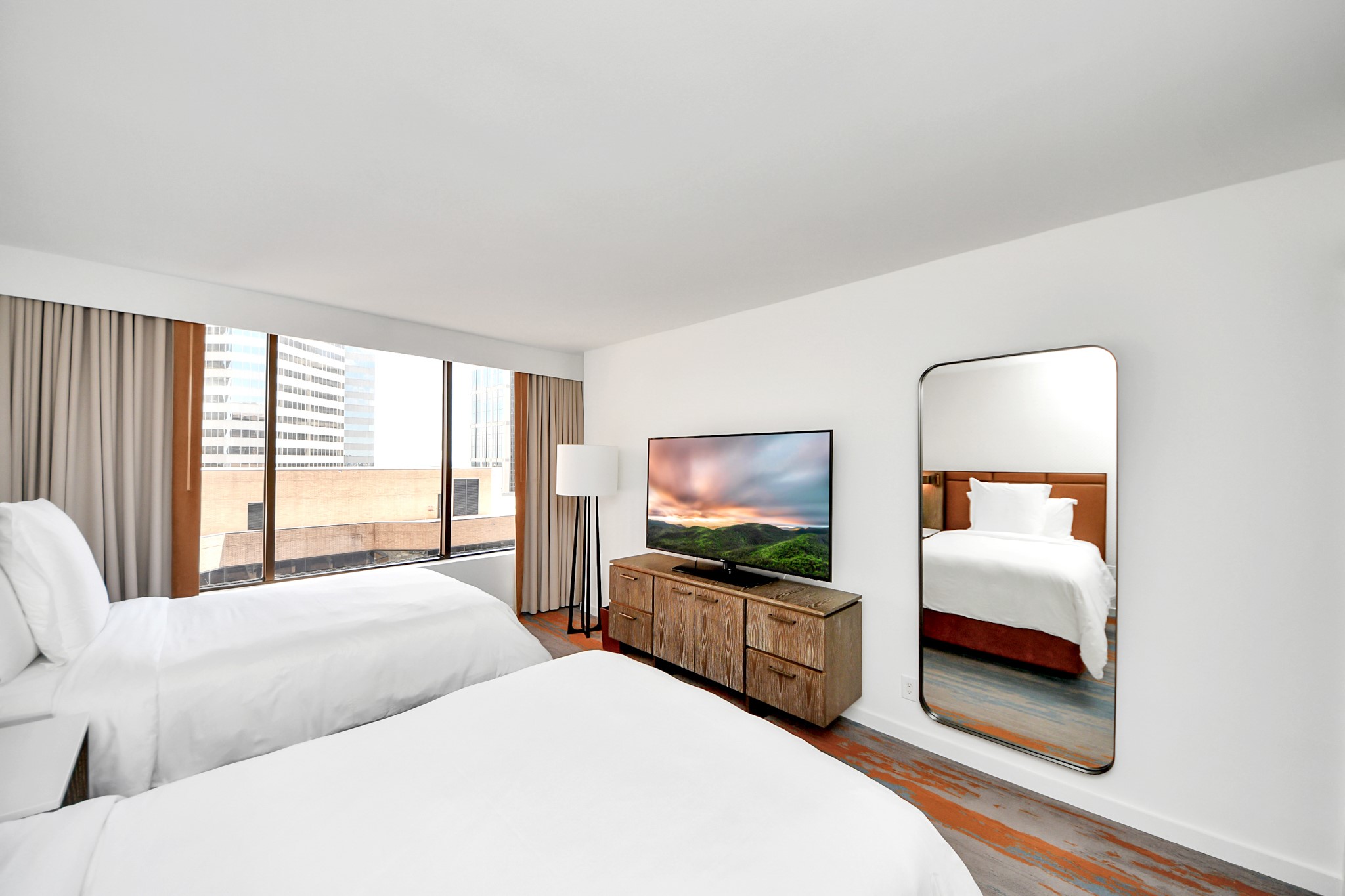 1300 Lamar Street, Unit S3 Houston, TX 77010 - Photo 21 of 50 a living room with furniture and a flat screen tv