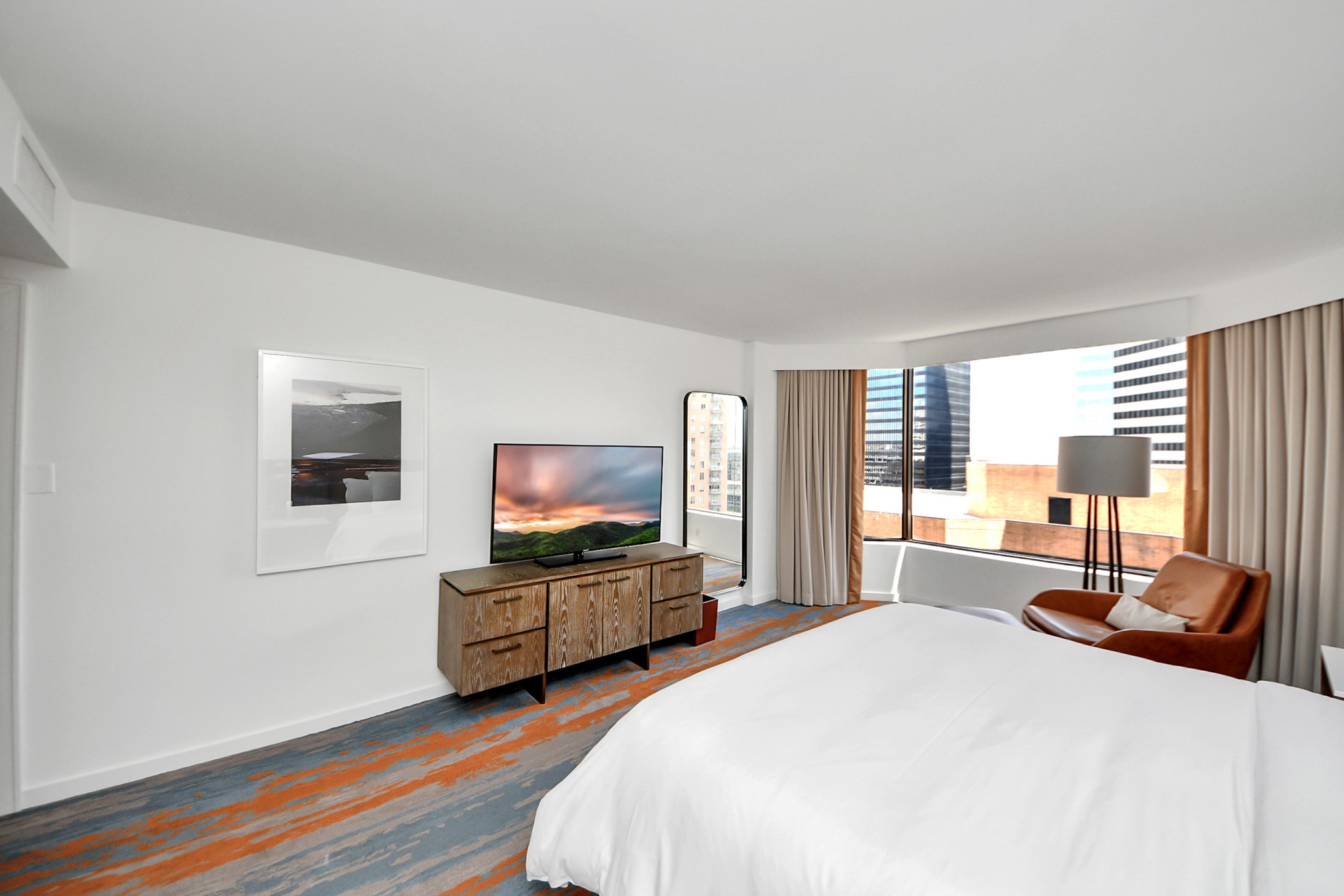 1300 Lamar Street, Unit S3 Houston, TX 77010 - Photo 33 of 50 a bedroom with a bed and furniture