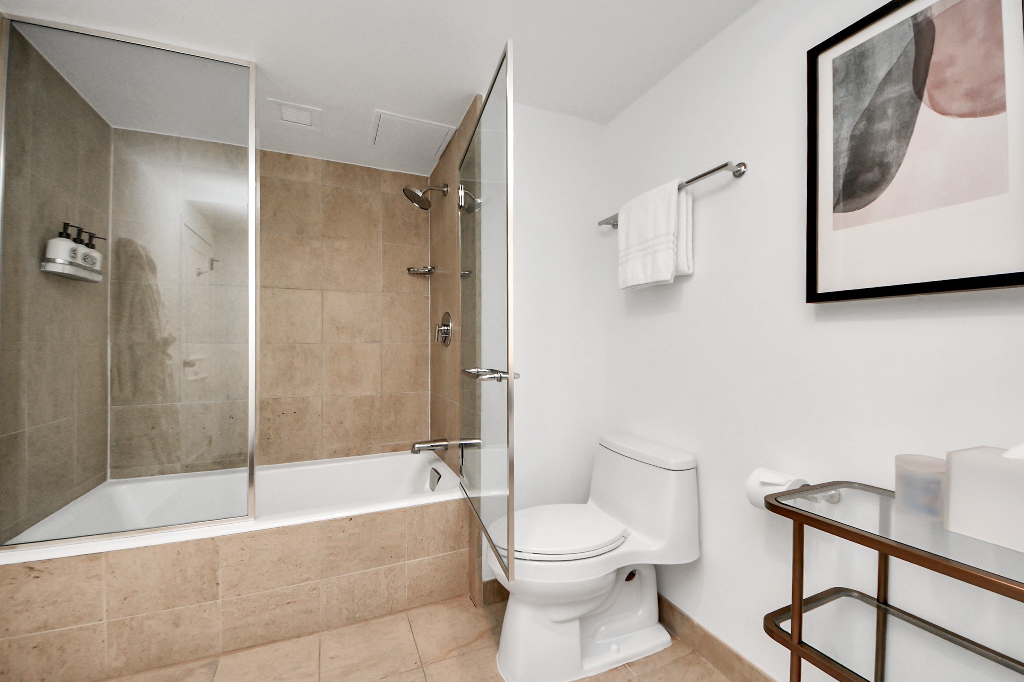1300 Lamar Street, Unit S3 Houston, TX 77010 - Photo 43 of 50 a bathroom with a toilet and a bathtub