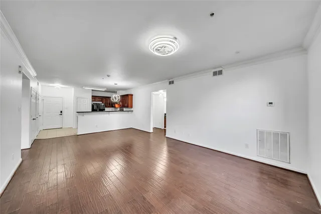 a view of a kitchen with a sink and a stove top oven