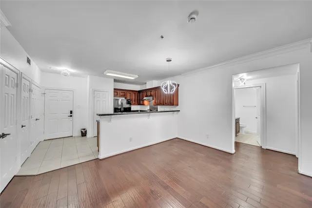 a view of a kitchen with electric appliances