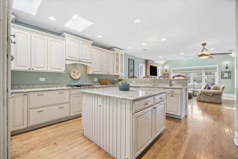 a kitchen with counter top space and cabinets