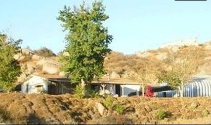 21680 Robin Road Nuevo, CA 92567 - Photo 1 of 1 a view of a house with a yard