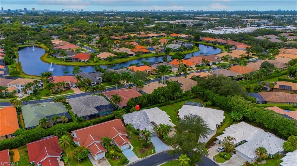 3609 Corinthian Way Naples, FL 34105 - Photo 2 of 23 View of urban area featuring a nearby body of water and nearby suburban area