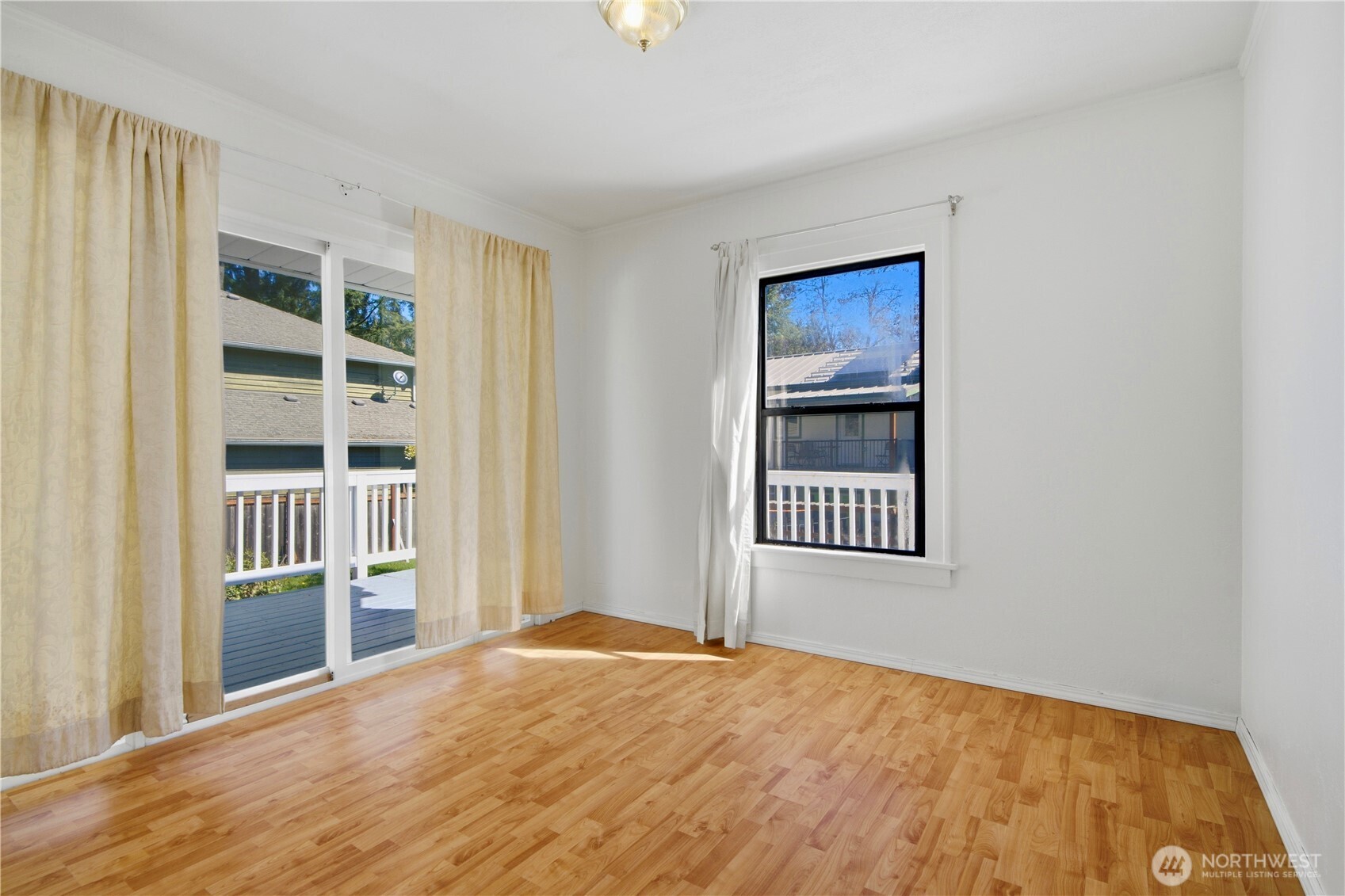 116 Northeast 133rd Street Seattle, WA 98125 - Photo 12 of 23 a view of an empty room with a window