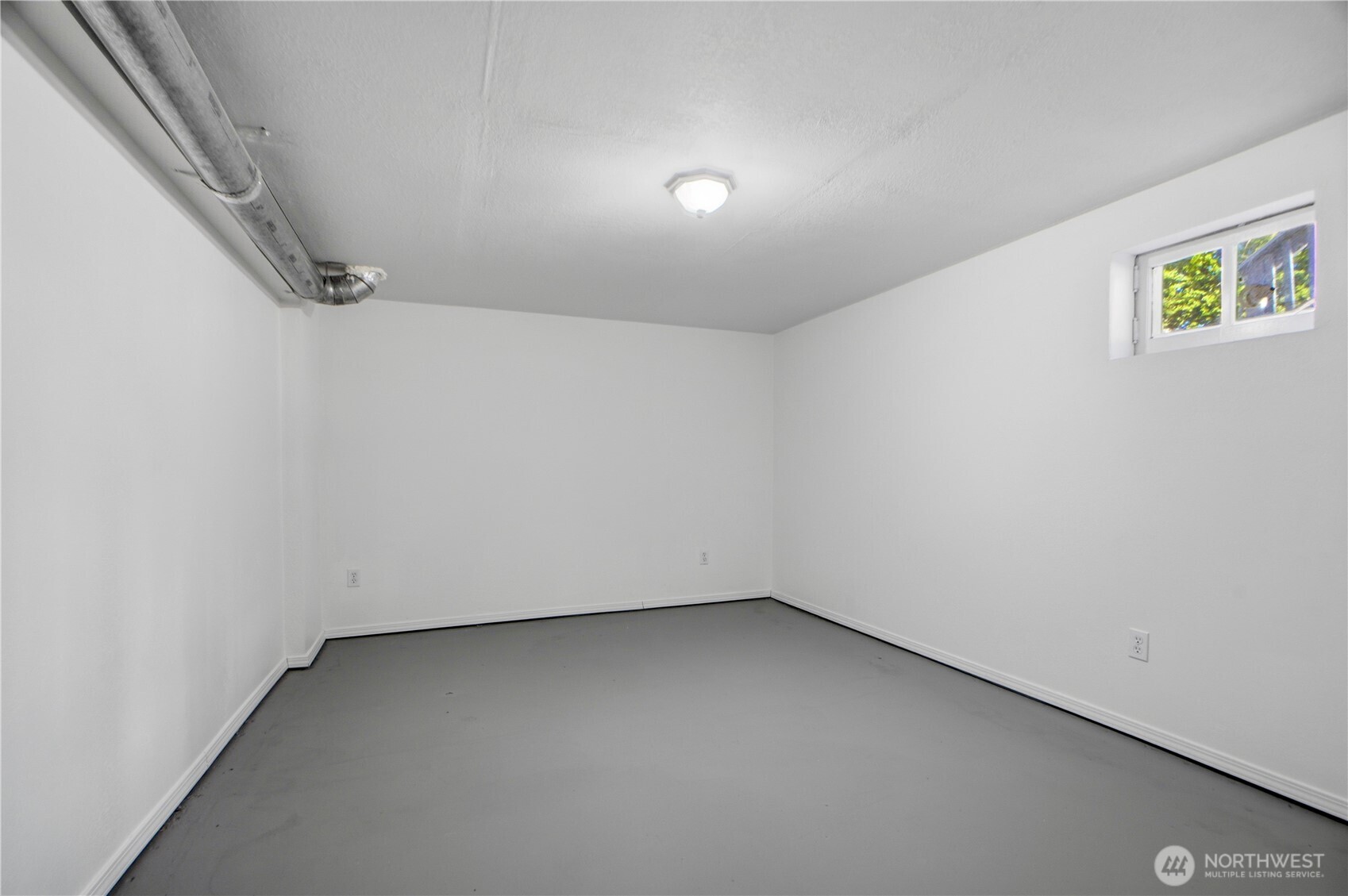 116 Northeast 133rd Street Seattle, WA 98125 - Photo 17 of 23 wooden floor in an empty room
