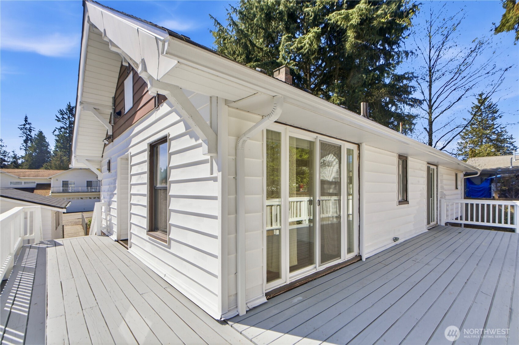 116 Northeast 133rd Street Seattle, WA 98125 - Photo 19 of 23 a view of a house with a deck