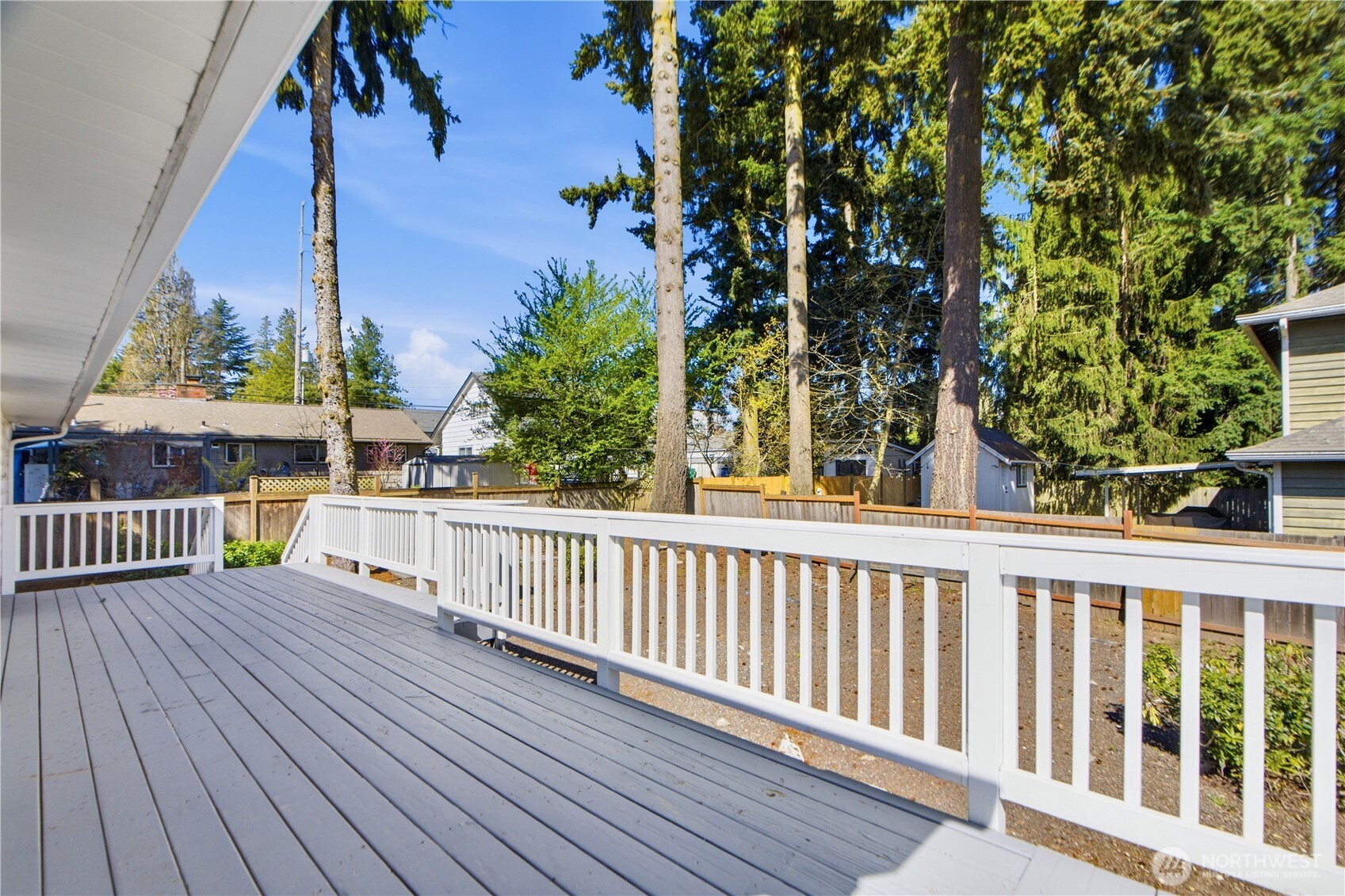116 Northeast 133rd Street Seattle, WA 98125 - Photo 20 of 23 a view of balcony with wooden floor and fence