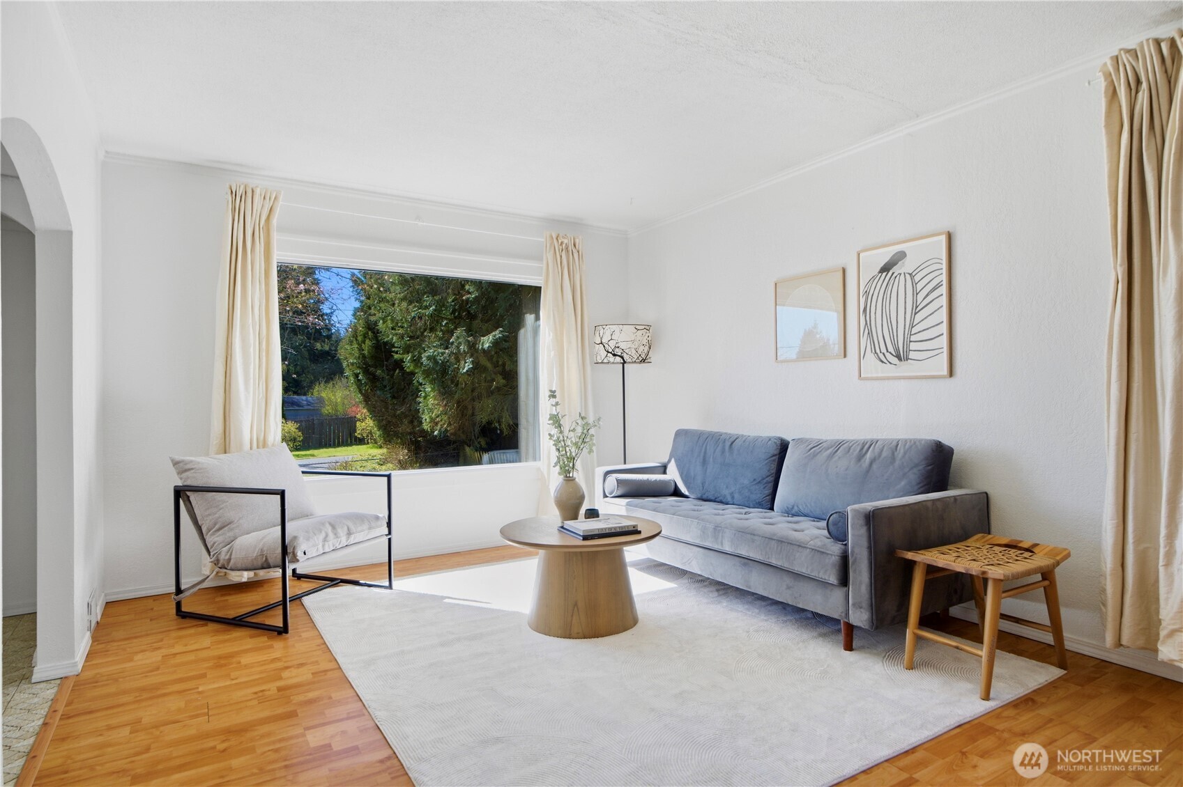 116 Northeast 133rd Street Seattle, WA 98125 - Photo 4 of 23 a living room with furniture and a potted plant