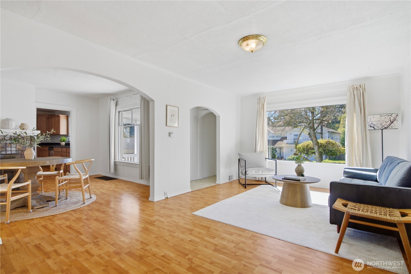 116 Northeast 133rd Street Seattle, WA 98125 - Photo 6 of 23 a living room with furniture and a window
