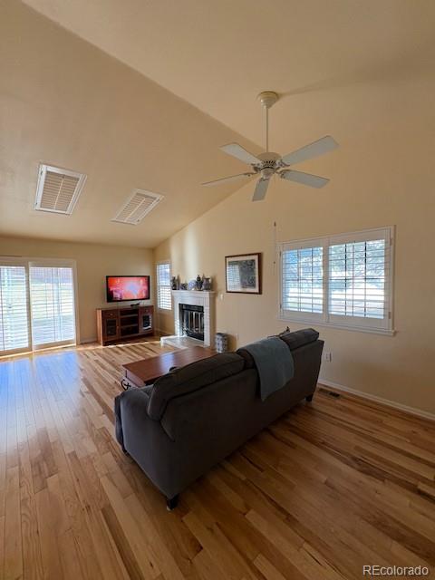 4 Shetland Court Highlands Ranch, CO 80130 - Photo 11 of 46 a living room with furniture a flat screen tv and a window