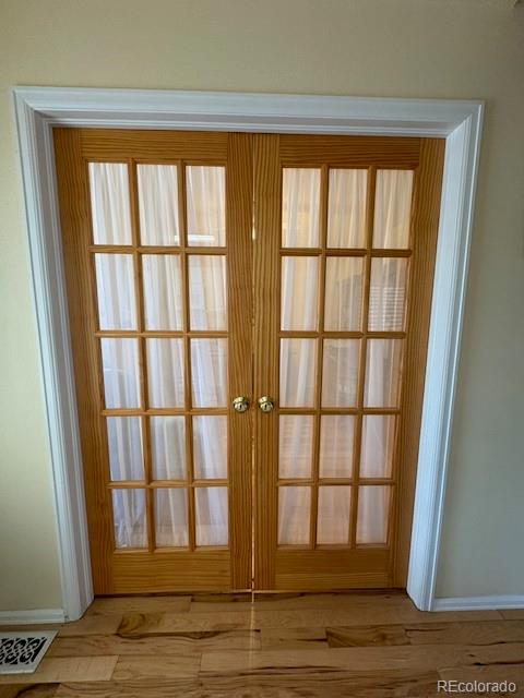 4 Shetland Court Highlands Ranch, CO 80130 - Photo 12 of 46 a view of empty room with wooden floor and fan