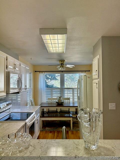 4 Shetland Court Highlands Ranch, CO 80130 - Photo 15 of 46 a living room with a large window
