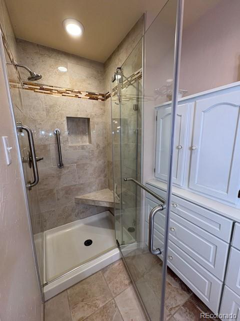 4 Shetland Court Highlands Ranch, CO 80130 - Photo 27 of 46 a bathroom with a shower