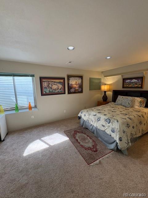 4 Shetland Court Highlands Ranch, CO 80130 - Photo 31 of 46 a bedroom with a bed and a large window