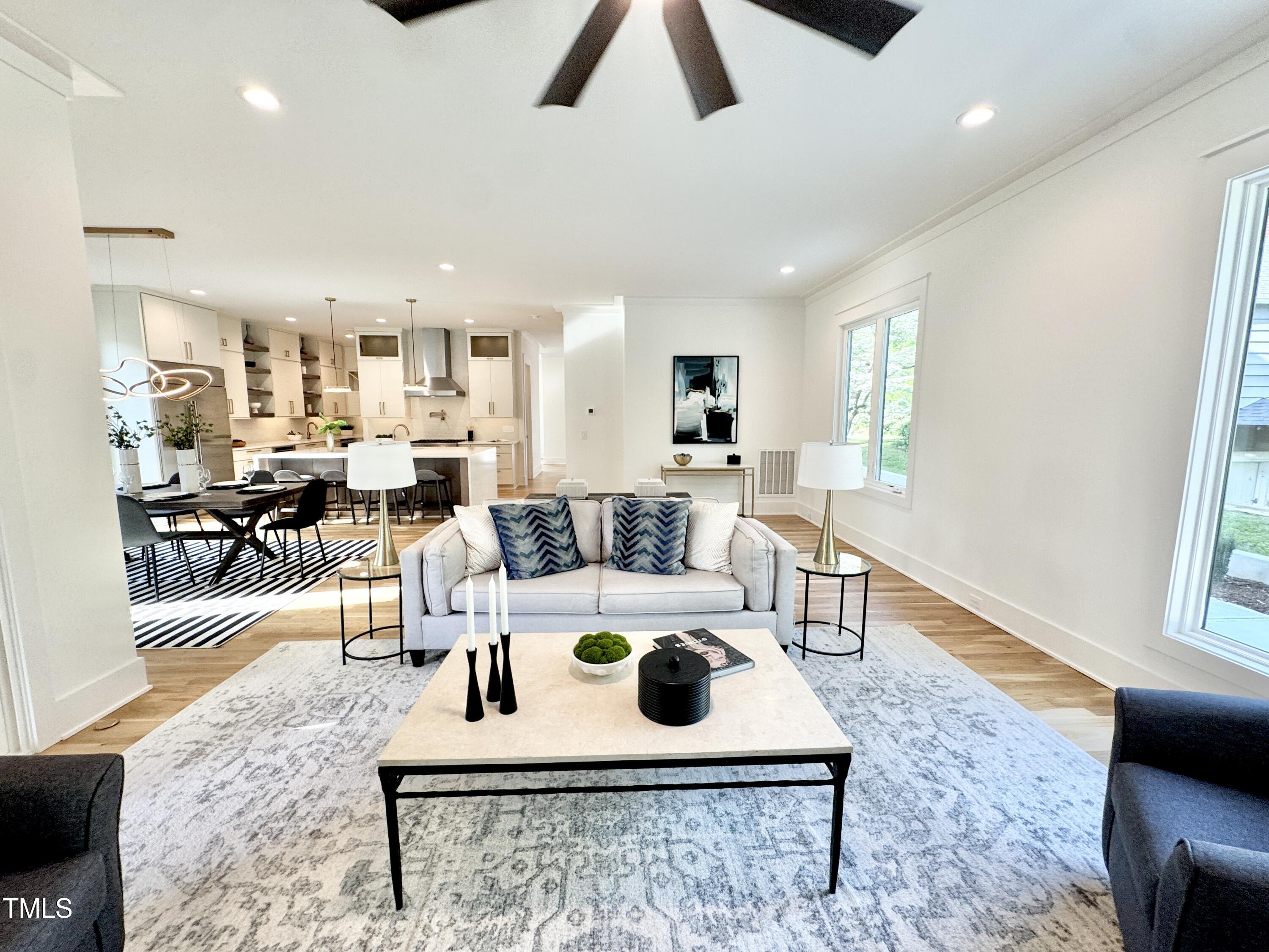 622 Glascock Street Raleigh, NC 27604 - Photo 31 of 81 a living room with furniture and a rug