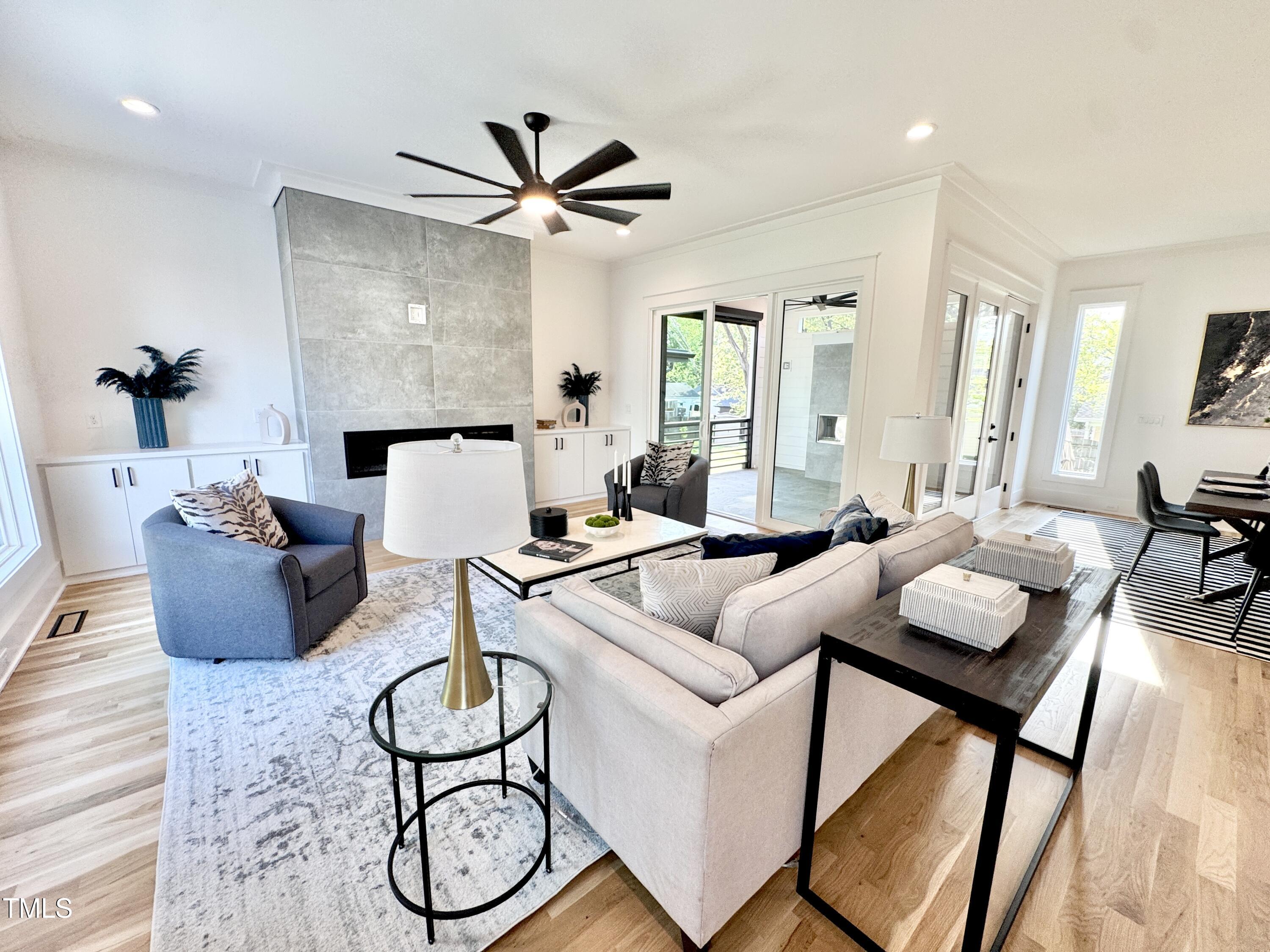 622 Glascock Street Raleigh, NC 27604 - Photo 33 of 81 a living room with furniture a rug and a window