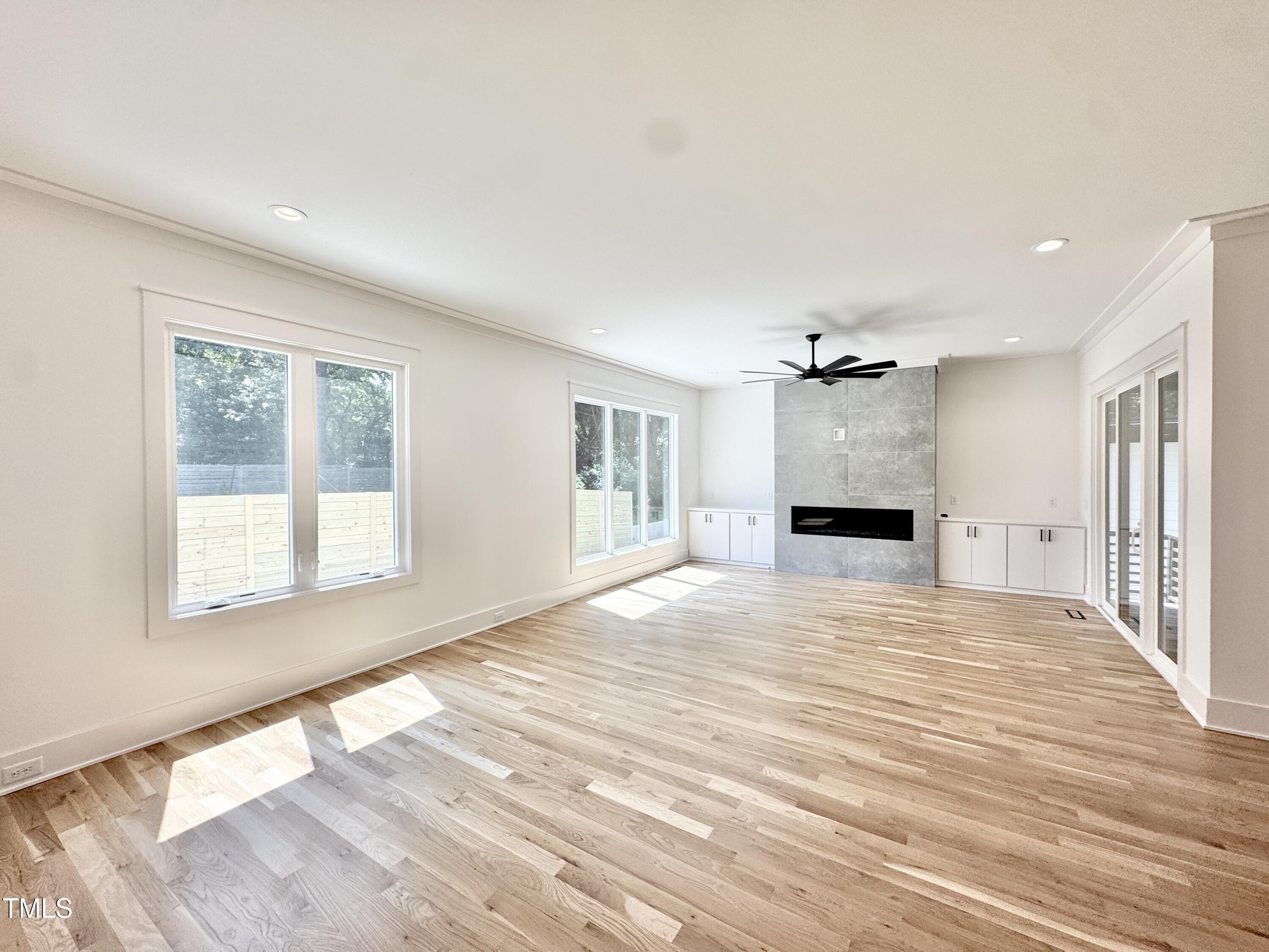 622 Glascock Street Raleigh, NC 27604 - Photo 34 of 81 a view of empty room with wooden floor and window
