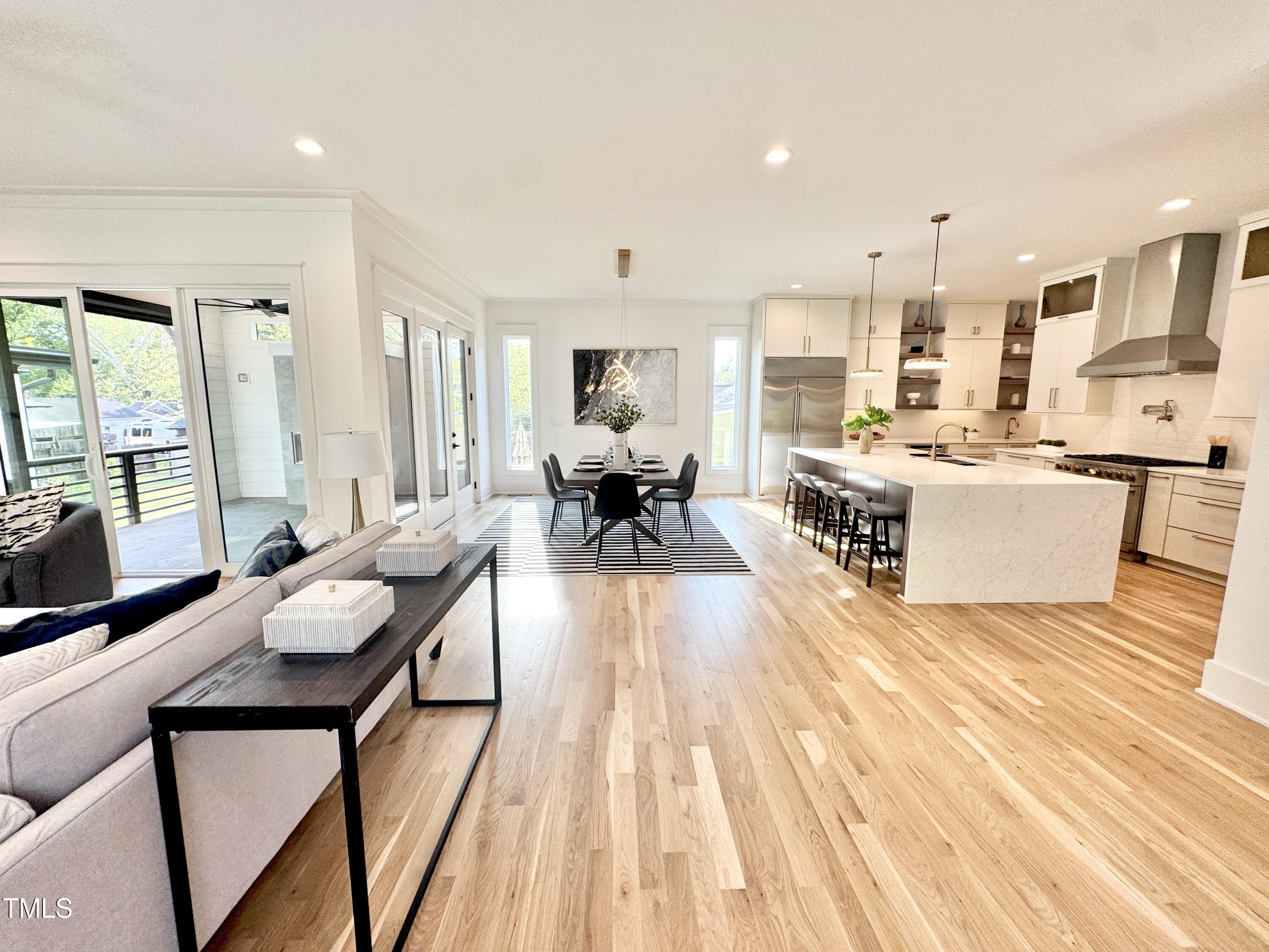622 Glascock Street Raleigh, NC 27604 - Photo 36 of 81 a living room with furniture and a table