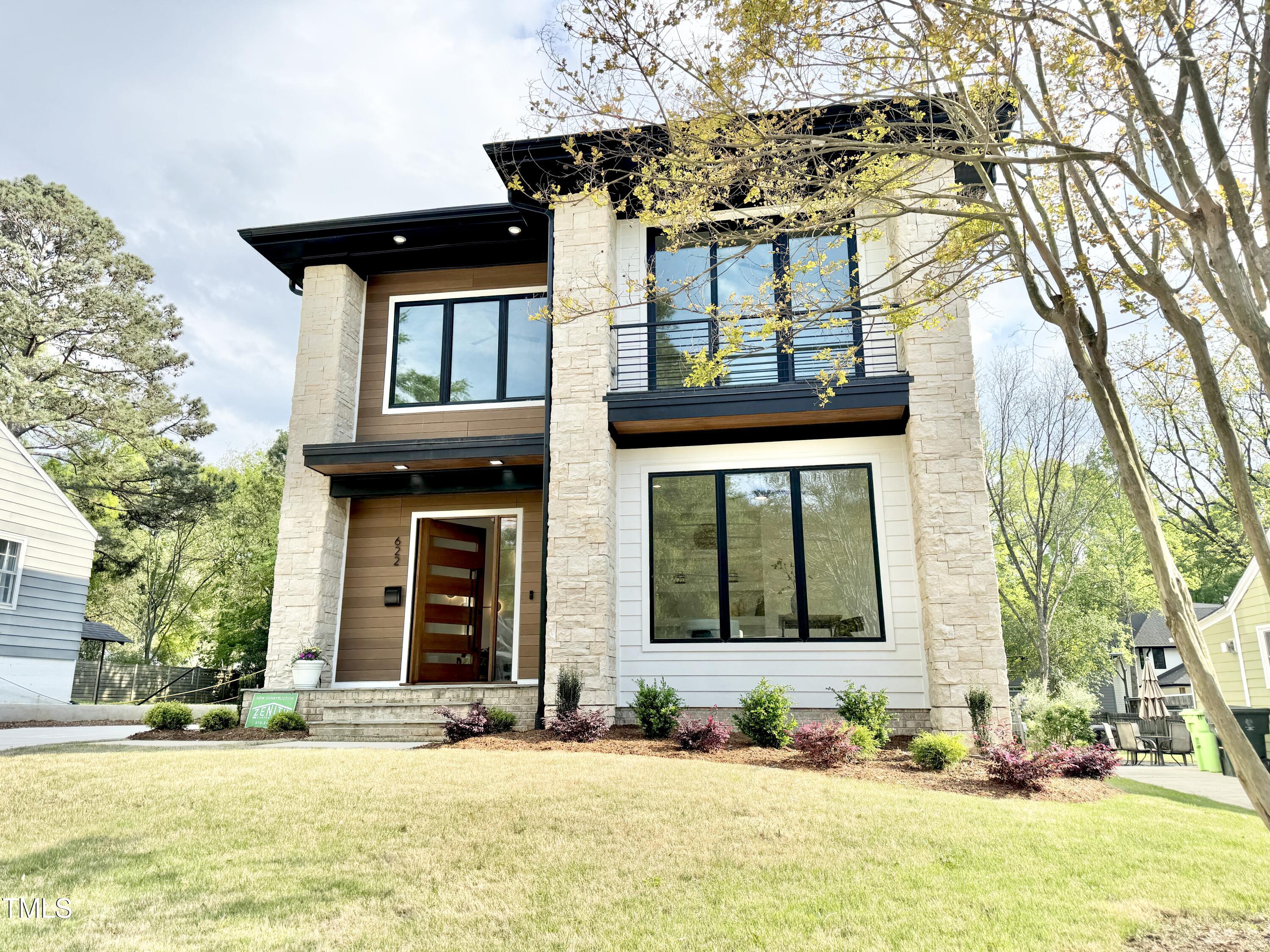 622 Glascock Street Raleigh, NC 27604 - Photo 5 of 81 a front view of a house with a yard