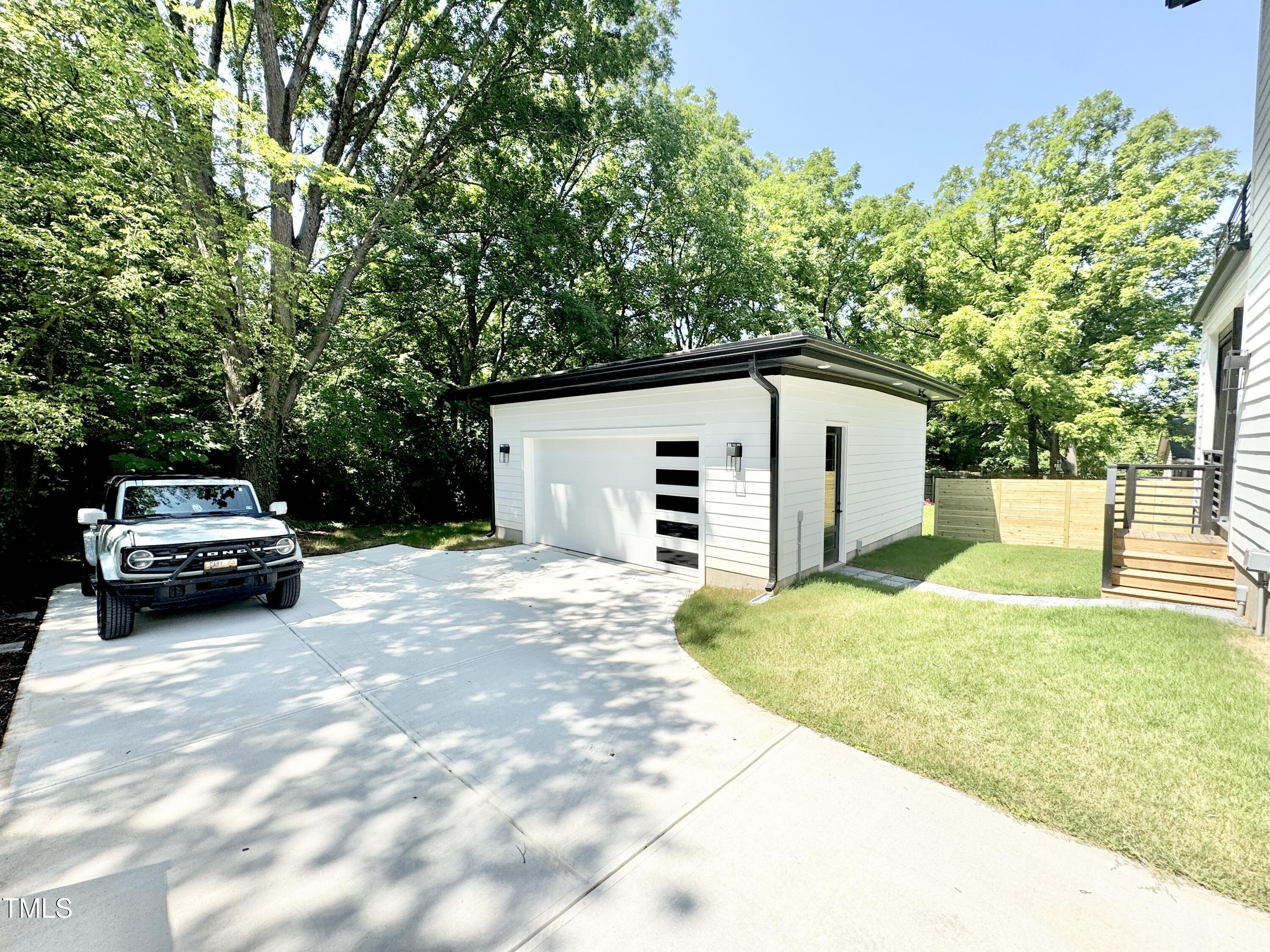 622 Glascock Street Raleigh, NC 27604 - Photo 6 of 81 a view of a white house and a yard