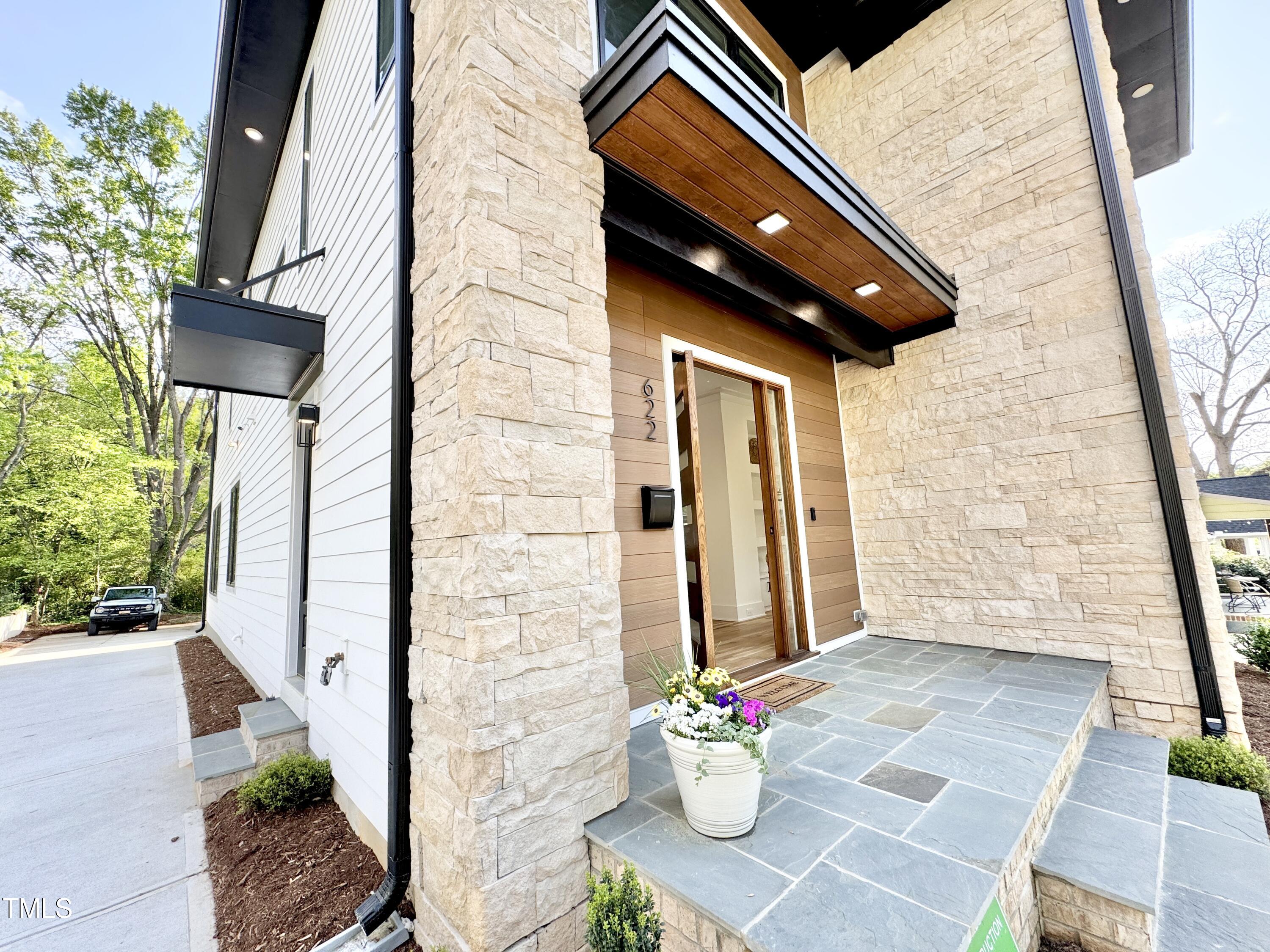 622 Glascock Street Raleigh, NC 27604 - Photo 7 of 81 a front view of a house with a yard