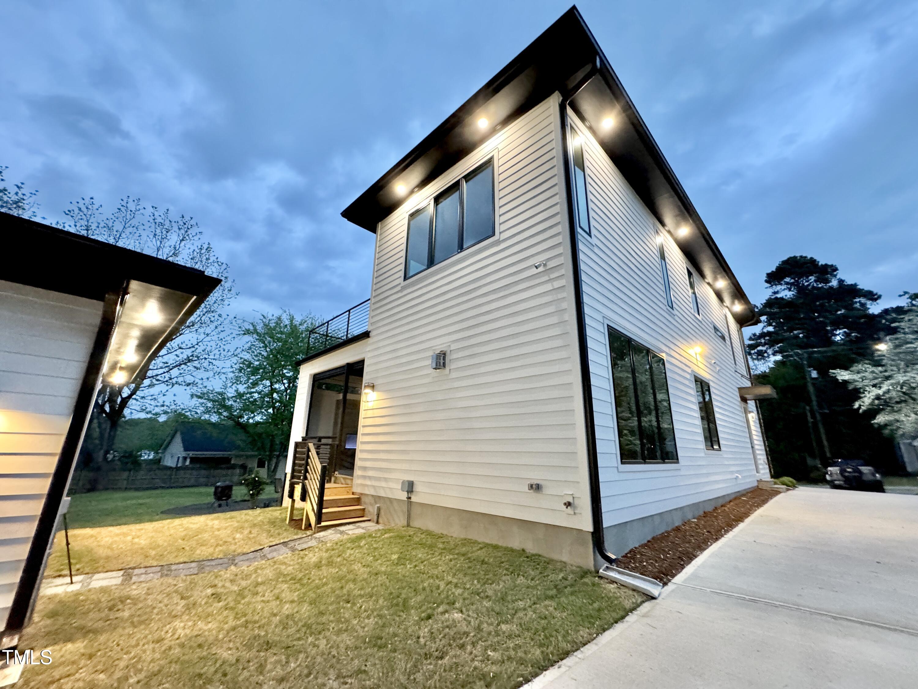 622 Glascock Street Raleigh, NC 27604 - Photo 72 of 81 a backyard of a house with seating space
