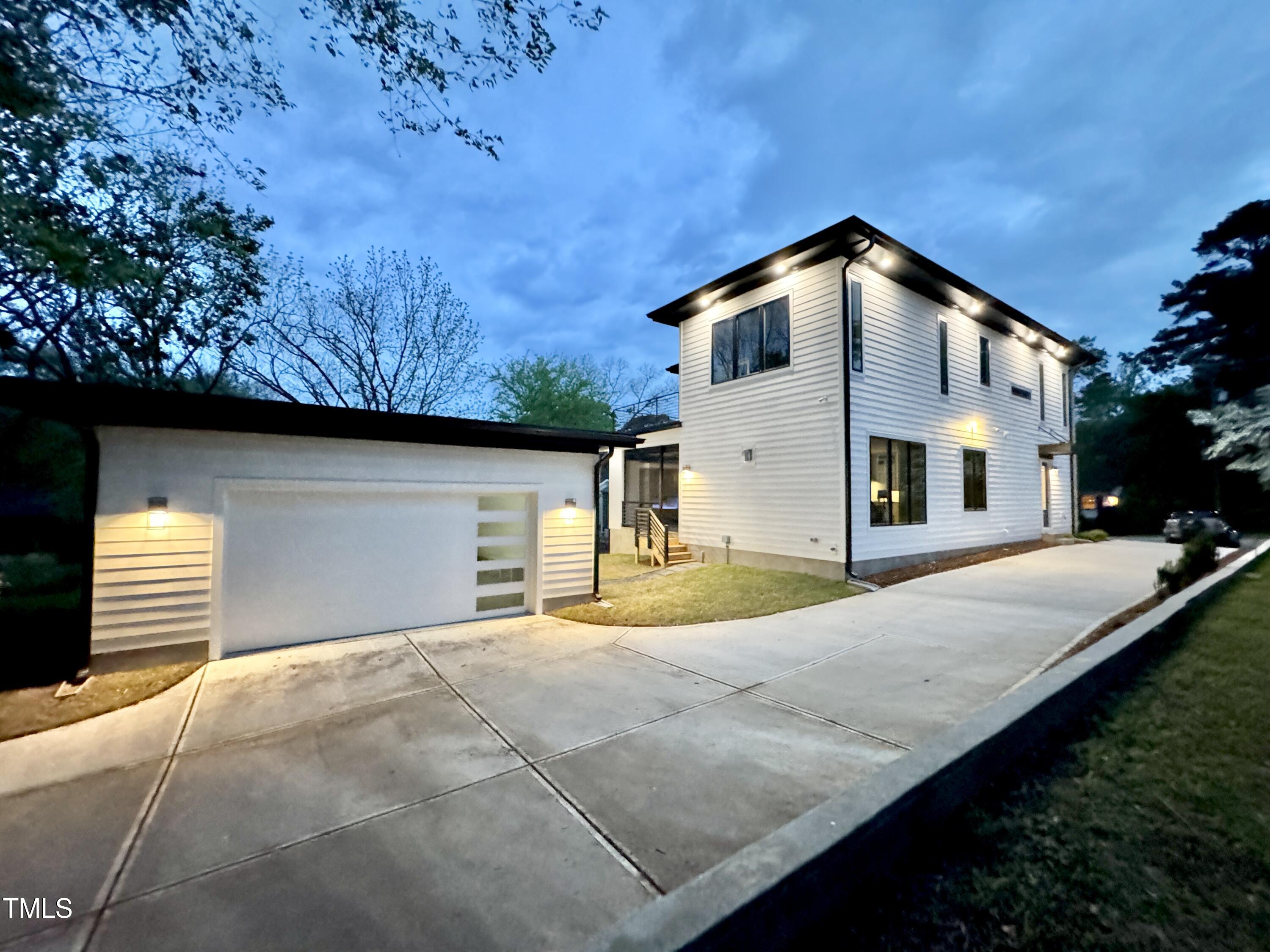 622 Glascock Street Raleigh, NC 27604 - Photo 74 of 81 a front view of a house with a garage