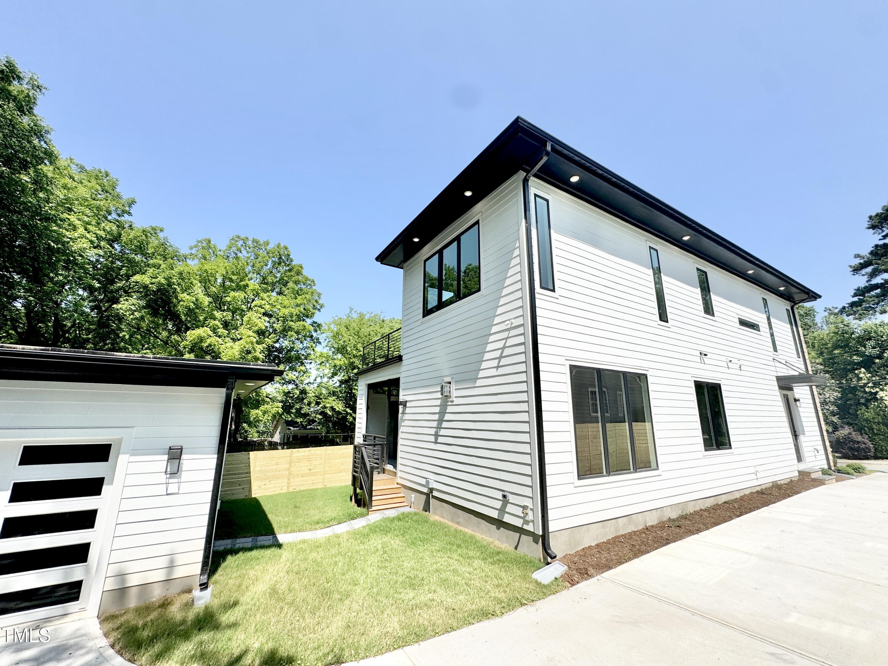 622 Glascock Street Raleigh, NC 27604 - Photo 79 of 81 a view of a house with a backyard