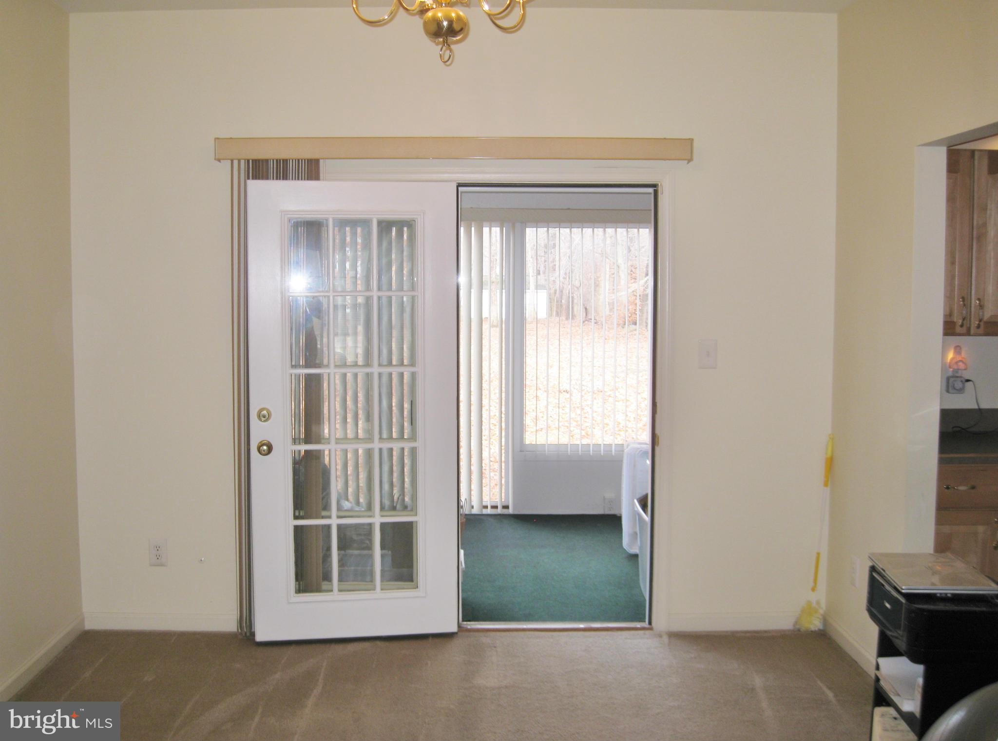 1901 Mitchellville Road Bowie, MD 20716 - Photo 12 of 20 a view of a livingroom with a staircase