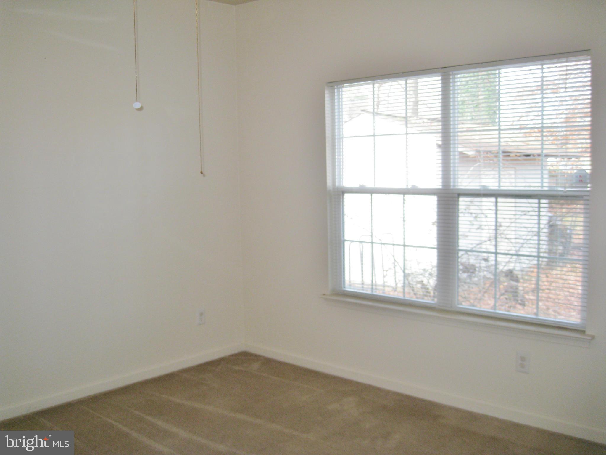 1901 Mitchellville Road Bowie, MD 20716 - Photo 15 of 20 an empty room with a window