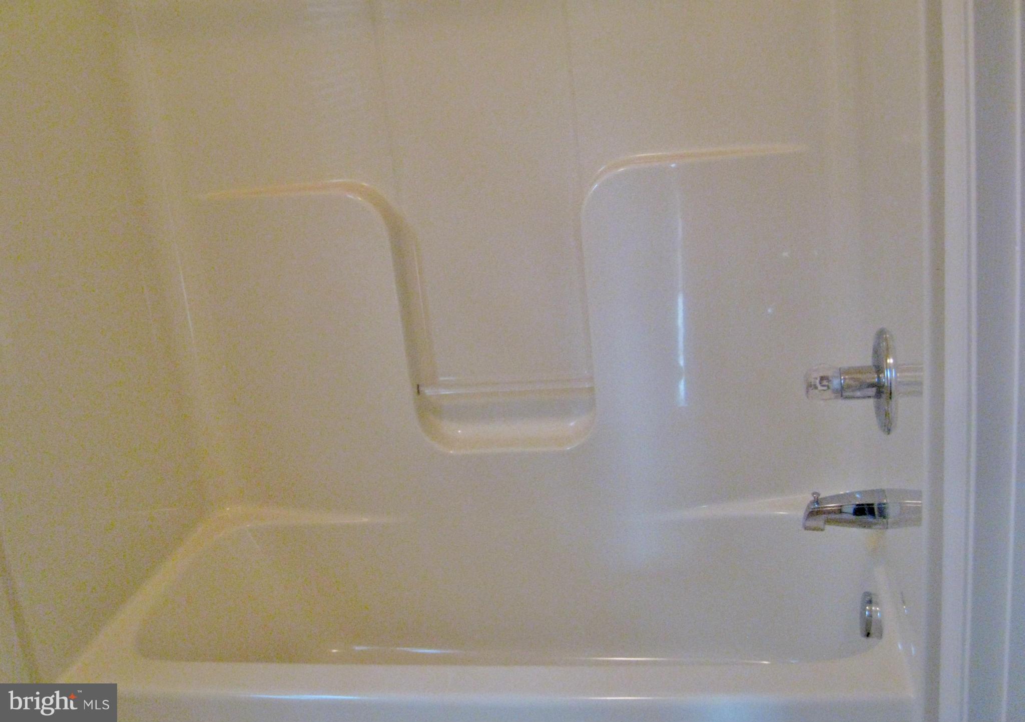 1901 Mitchellville Road Bowie, MD 20716 - Photo 18 of 20 a bathroom with a bathtub
