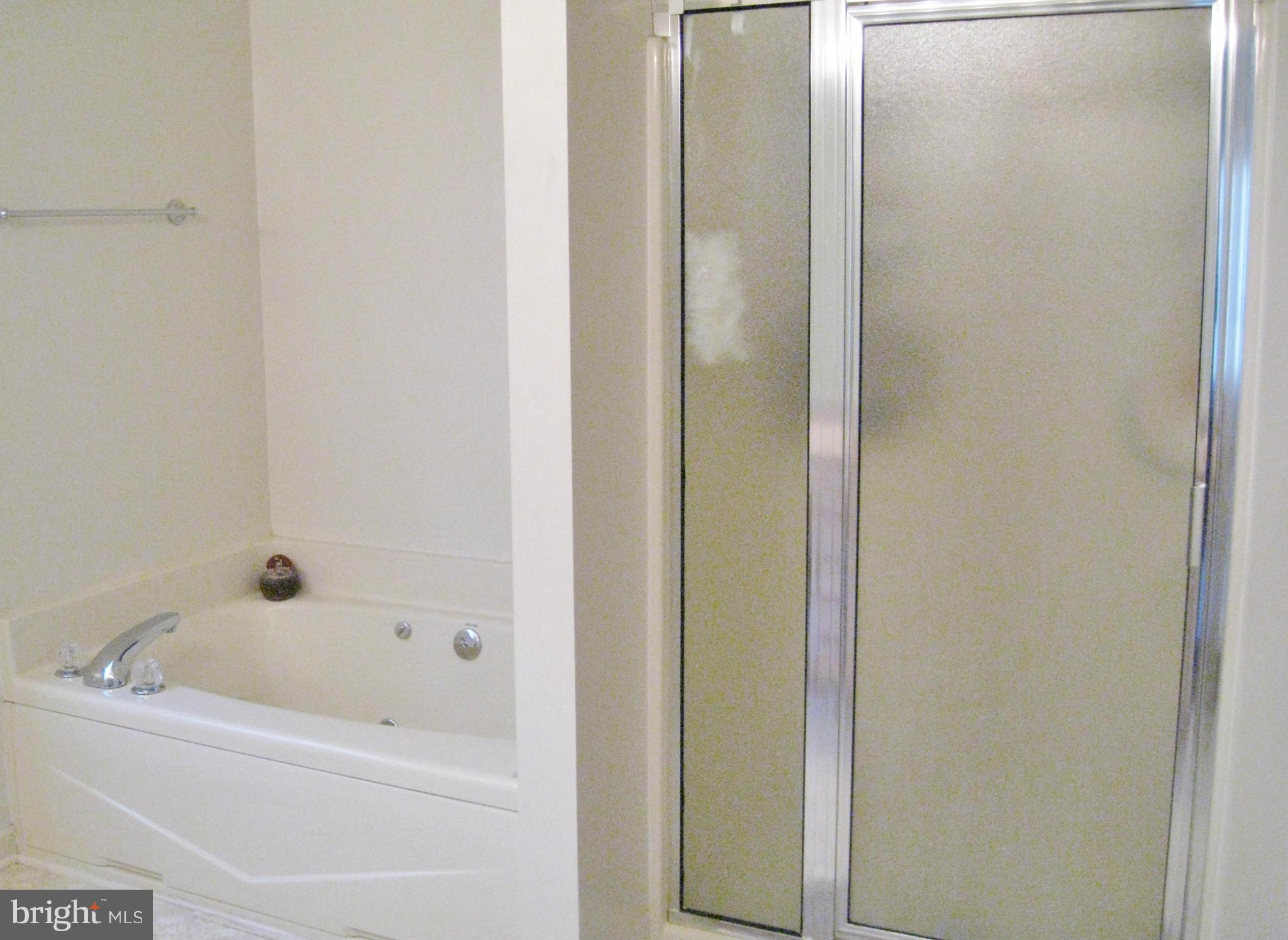 1901 Mitchellville Road Bowie, MD 20716 - Photo 20 of 20 a bathroom with a bathtub