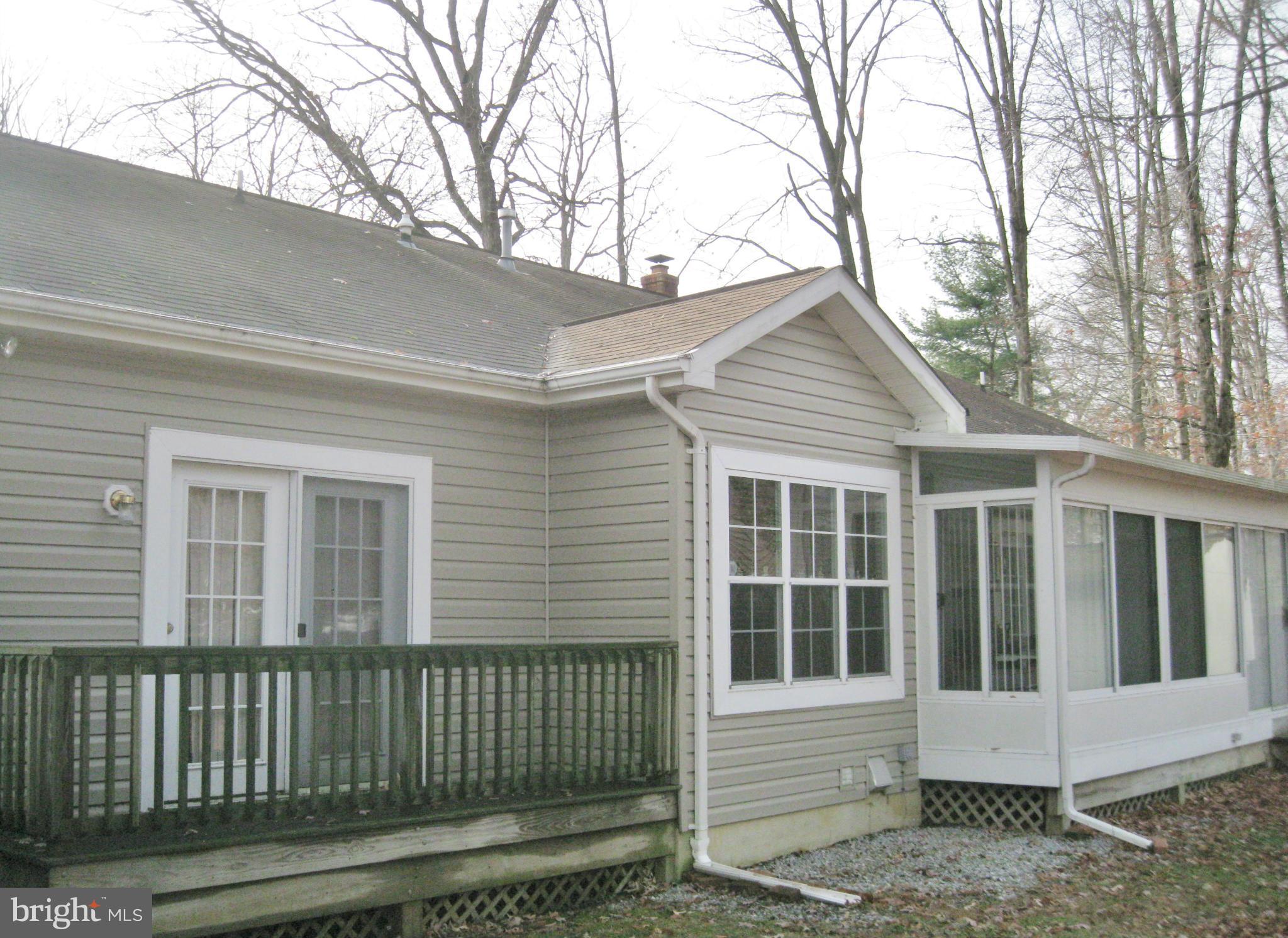 1901 Mitchellville Road Bowie, MD 20716 - Photo 3 of 20 a view of a house with a yard and large tree