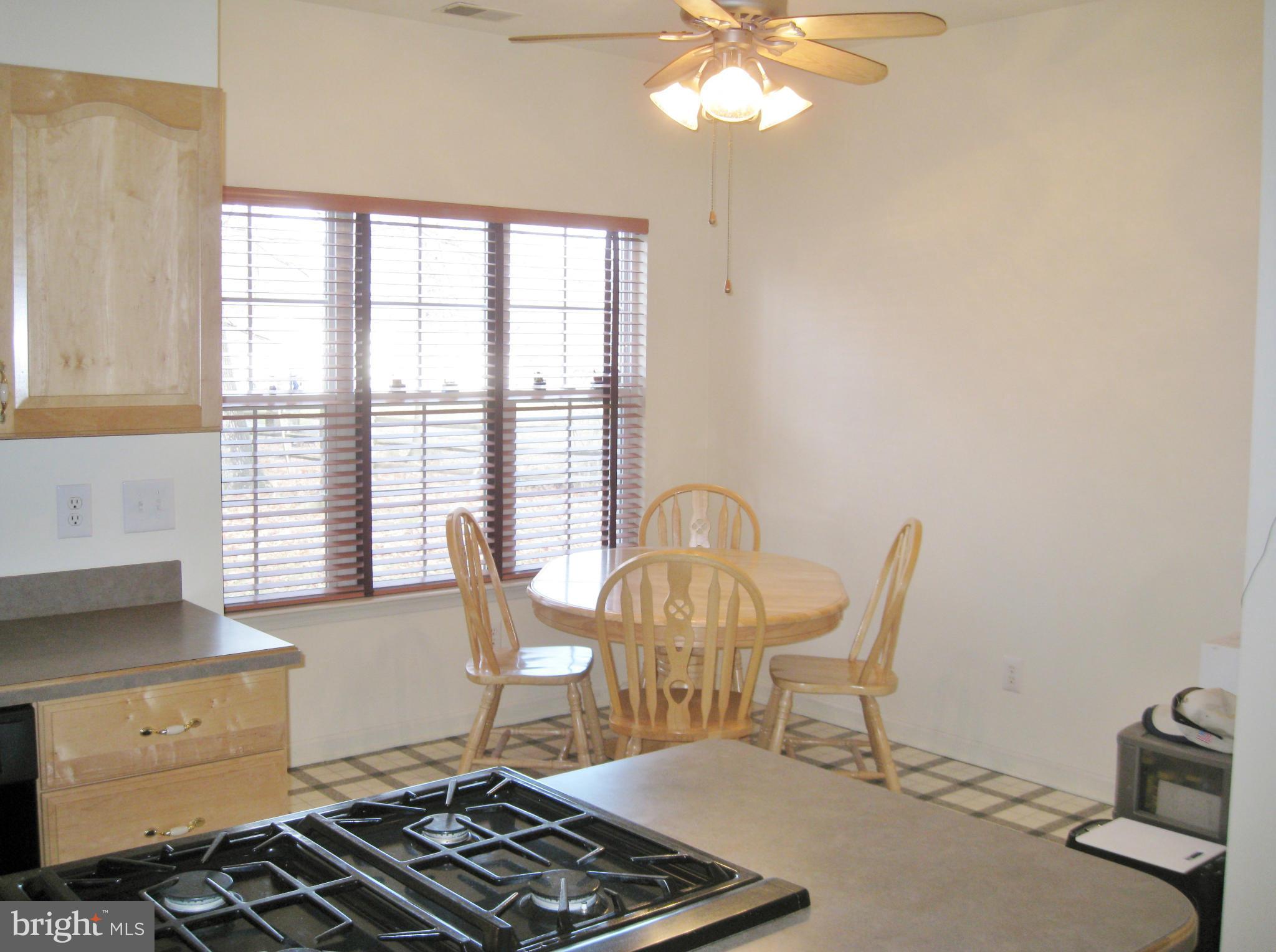 1901 Mitchellville Road Bowie, MD 20716 - Photo 8 of 20 a living room with furniture and a window