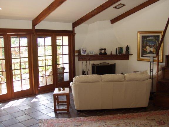 453 Las Alturas Road Santa Barbara, CA 93103 - Photo 3 of 21 a living room with furniture and a fireplace