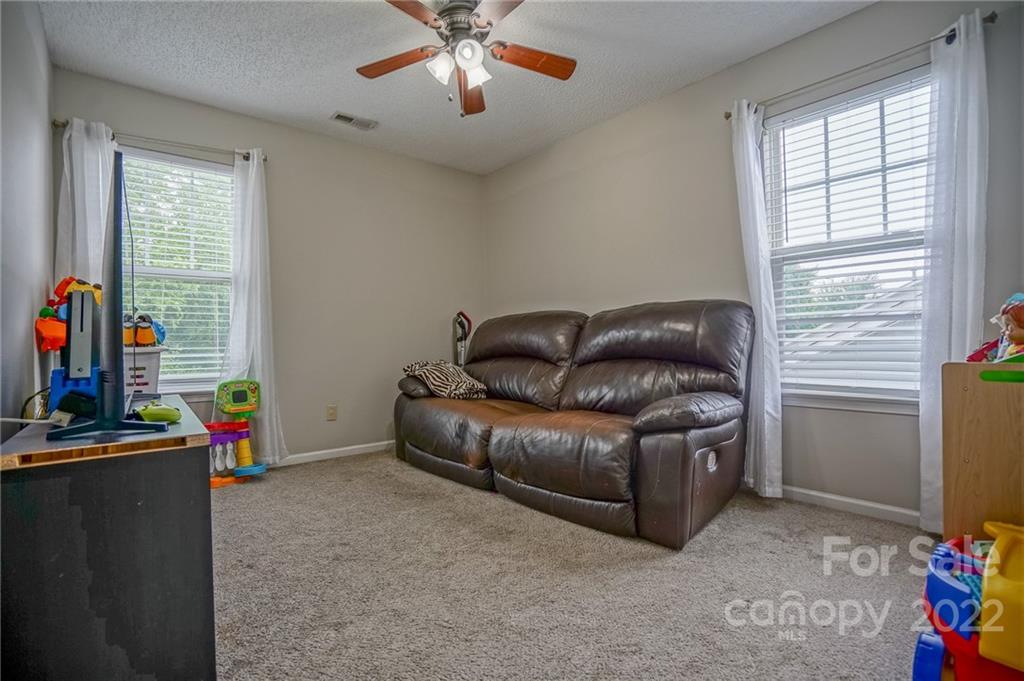 839 Matthews School Road Matthews, NC 28105 - Photo 30 of 37 a living room with furniture and a window