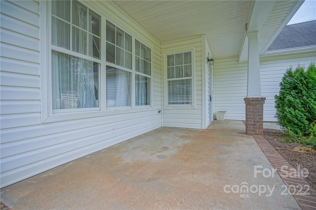 839 Matthews School Road Matthews, NC 28105 - Photo 5 of 37 a view of an empty room with a window