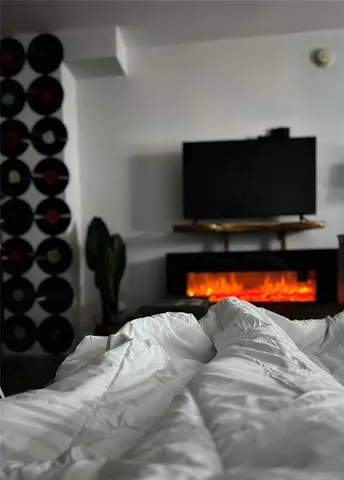 a view of living room with furniture and floor to ceiling window